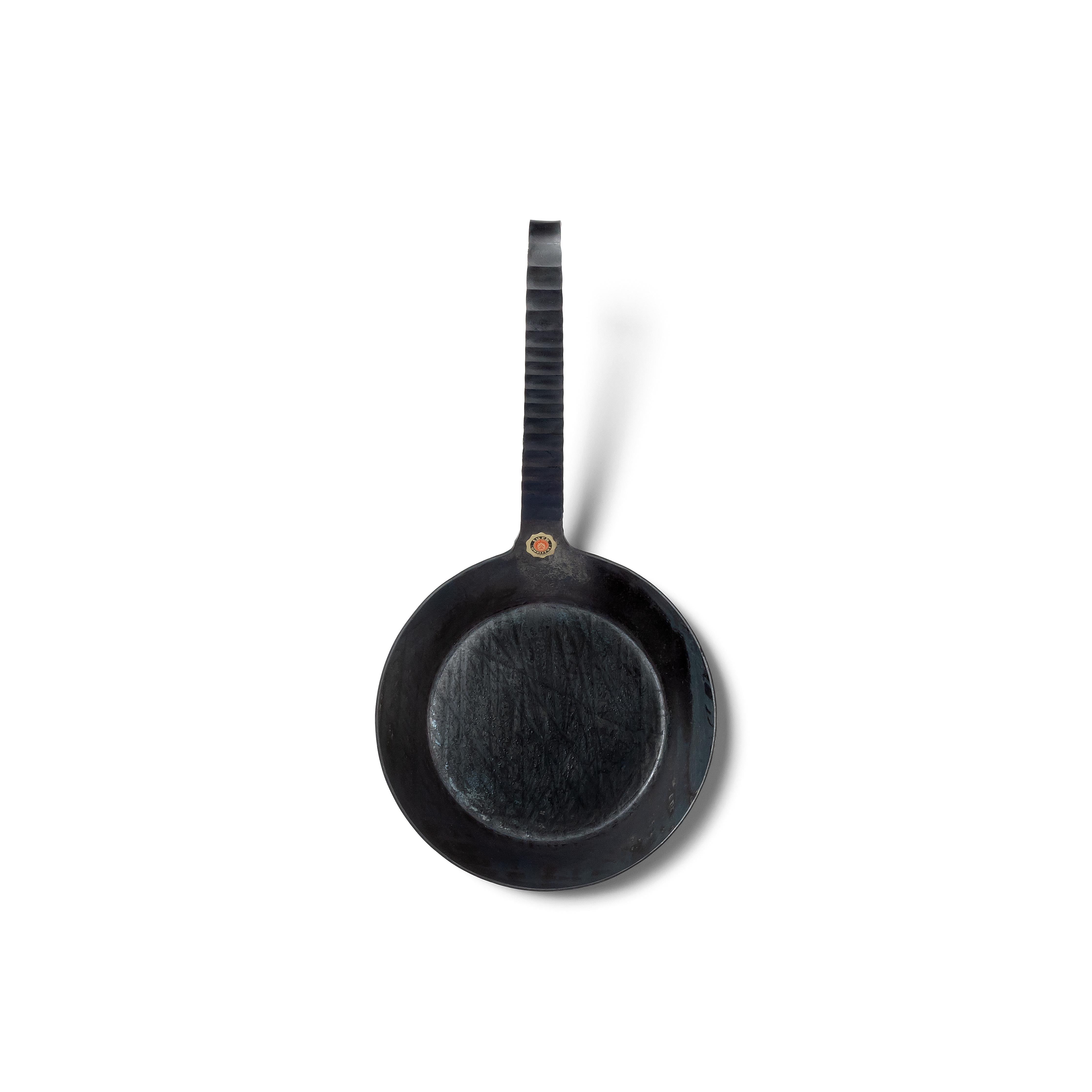Draufsicht der handgeschmiedeten Eisenbratpfanne von Turk mit Bodendurchmesser 18 cm