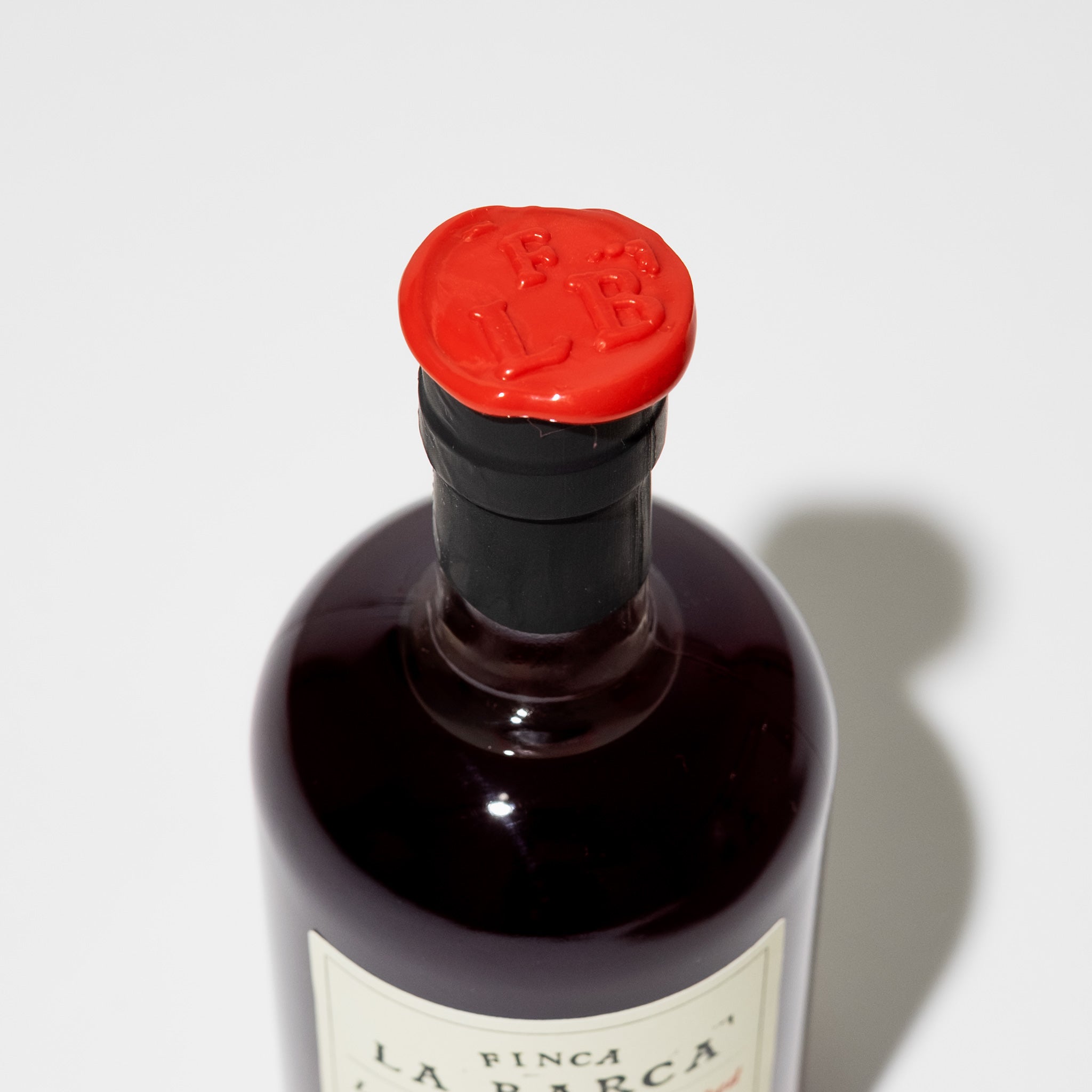 mood: Finca_la_Barca_gereauchertes_Chilliöl_Detail_Wachsstempel_Flasche_200ml